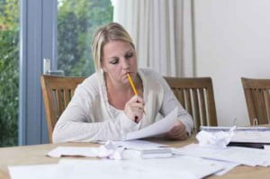 Woman stressing over bills